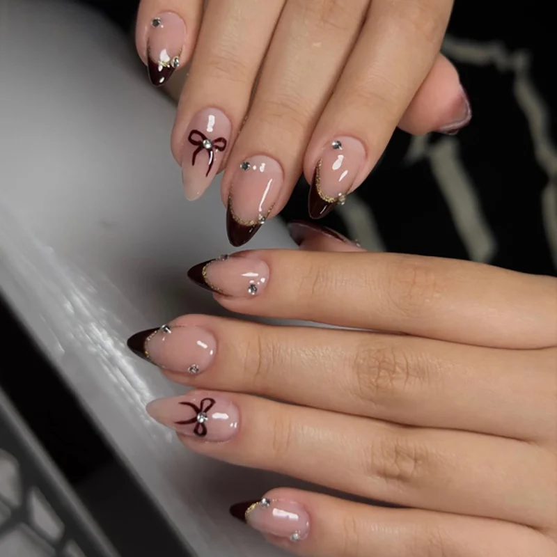 Artful Nail Art with Elegant Bow Decoration Stornfield