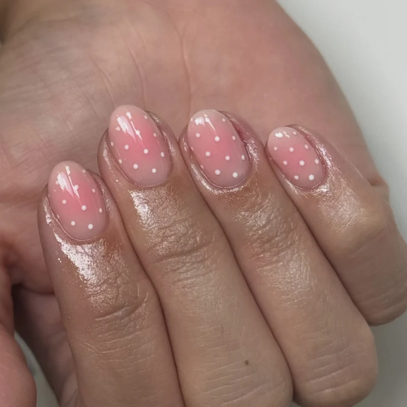 Artful nail art in soft ombre look with dots Stornfield