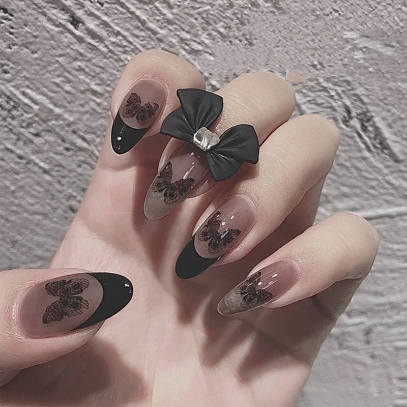 Artful nail art in Gothic style with butterfly motifs Stornfield