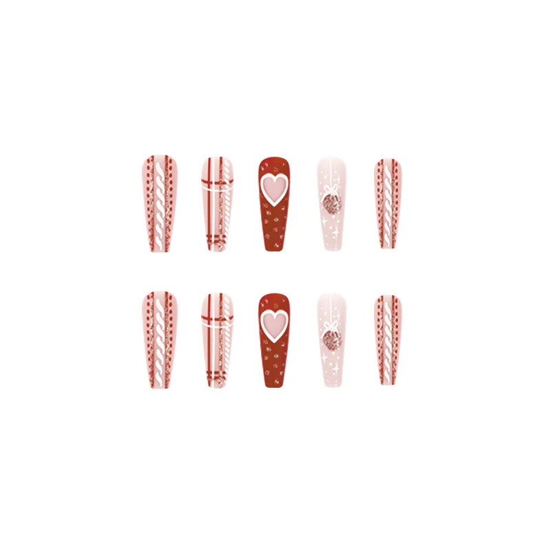 Artful nail art in festive design with heart and Christmas motifs Stornfield