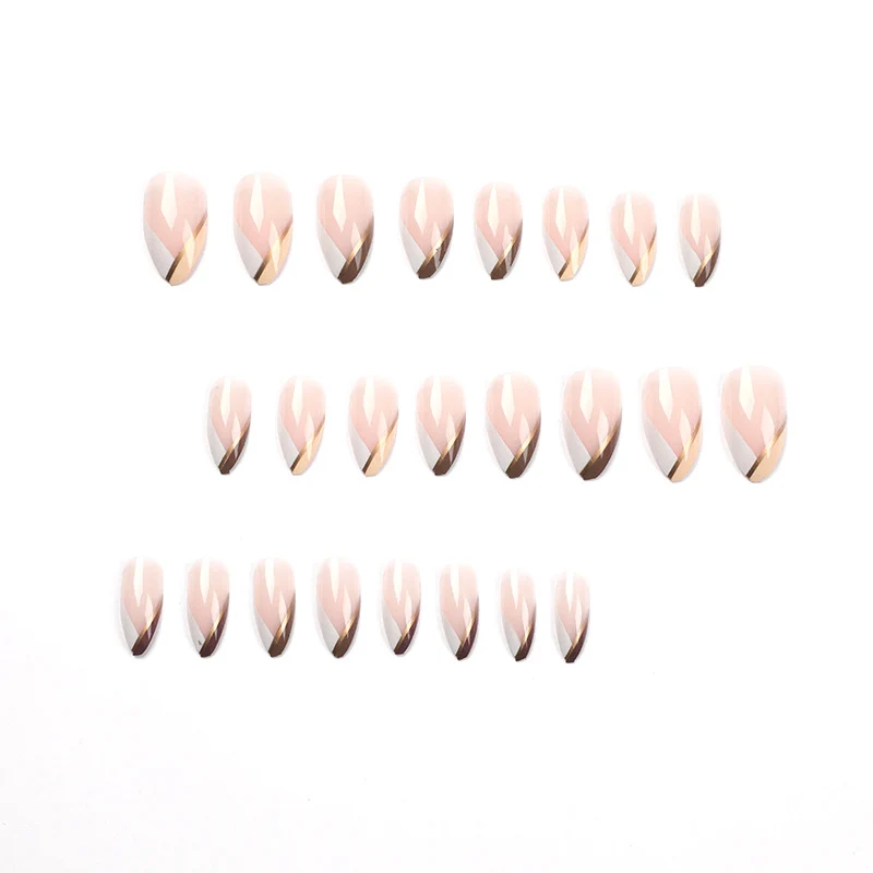 Artful nail art in elegant stiletto design with golden accents Stornfield