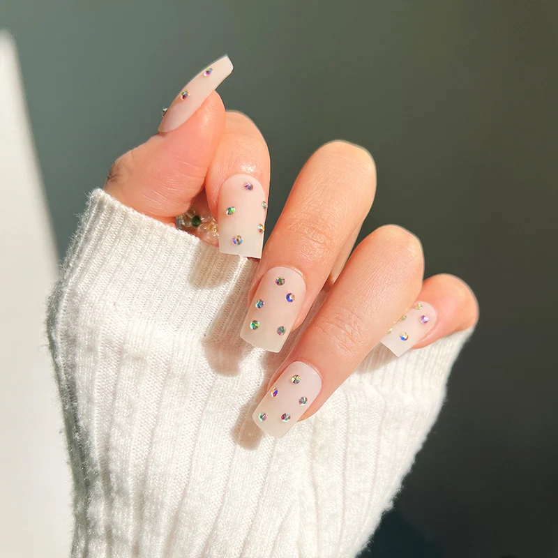 Artistic nail art with elegant rhinestone embellishments Stornfield