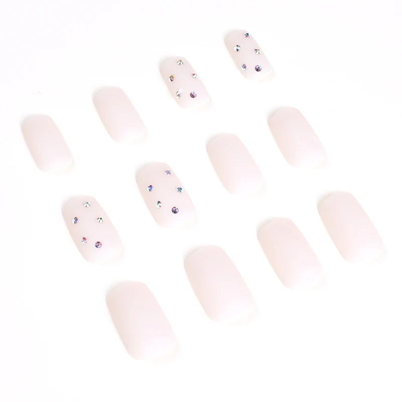 Artistic nail art with elegant rhinestone embellishments Stornfield