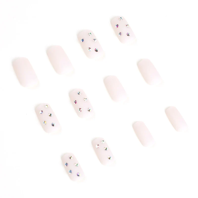 Artistic nail art with elegant rhinestone embellishments Stornfield