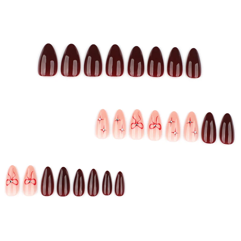 Artful nail art with elegant bows and rhinestone embellishments Stornfield