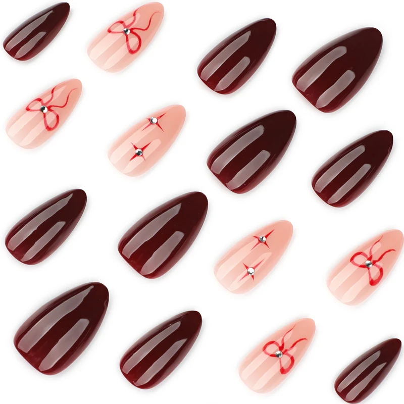 Artful nail art with elegant bows and rhinestone embellishments Stornfield
