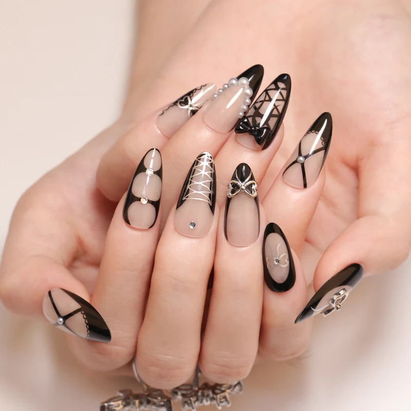 Artful nail art with elegant bows and glitter accents Stornfield