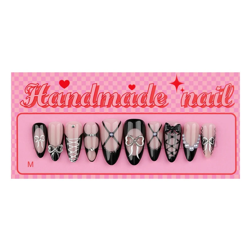 Artful nail art with elegant bows and glitter accents Stornfield