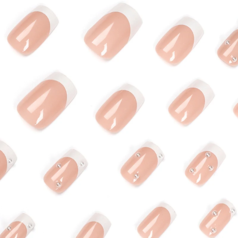 Artful nail art with elegant pearl and glitter accents Stornfield