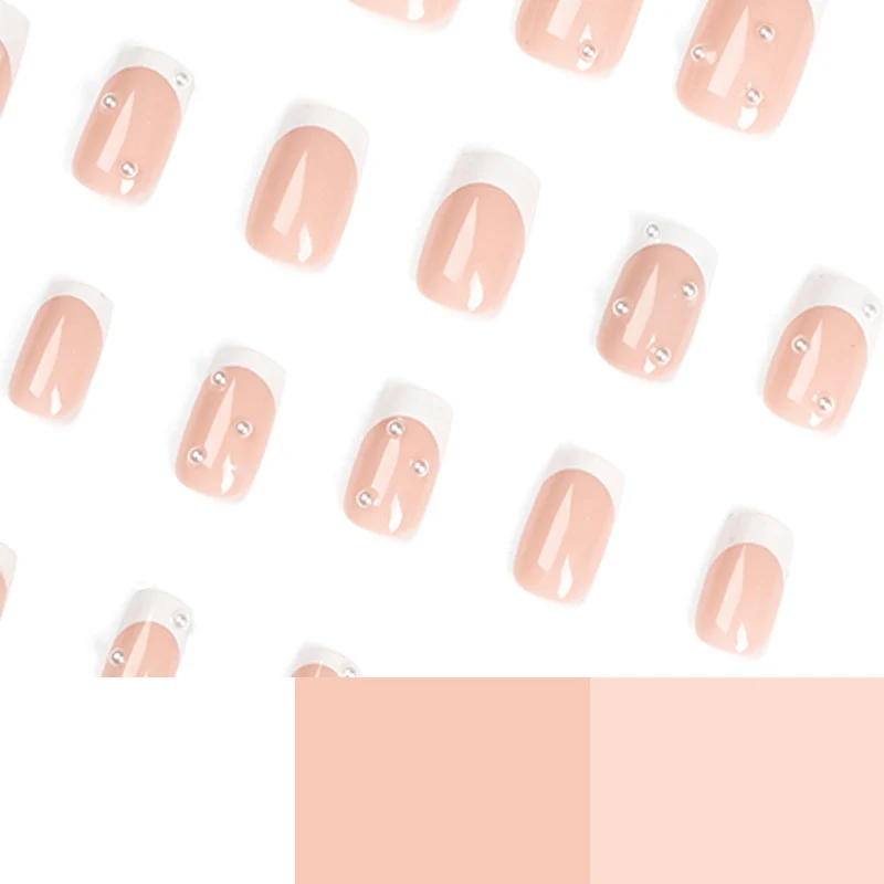 Artful nail art with elegant pearl and glitter accents Stornfield