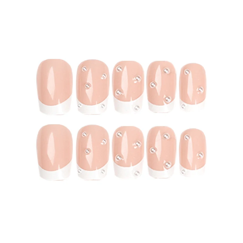 Artful nail art with elegant pearl and glitter accents Stornfield