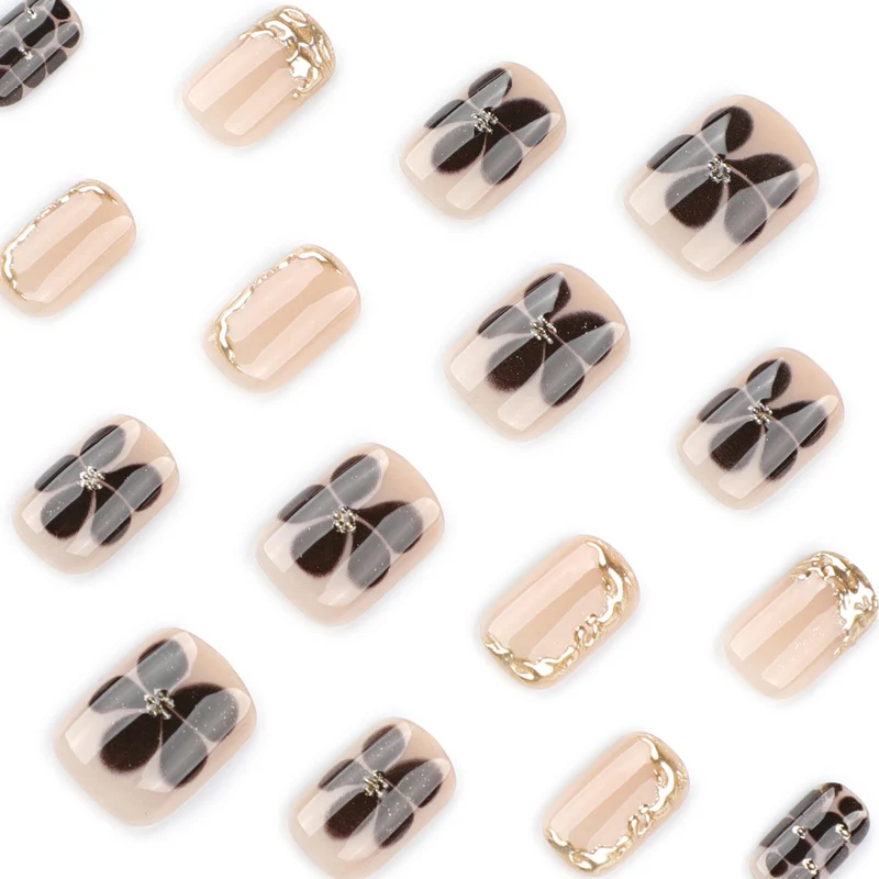 Artistic Nail Art with Elegant Golden Accents Stornfield