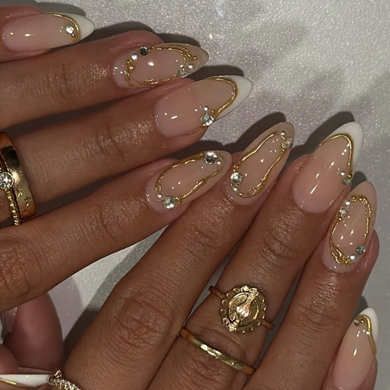 Artistic Nail Art with Elegant Gold Accents Stornfield