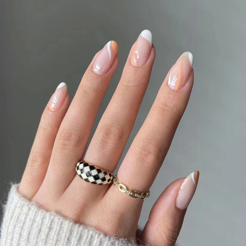 Artful Nail Art with Elegant French Tips and Creative Designs Stornfield