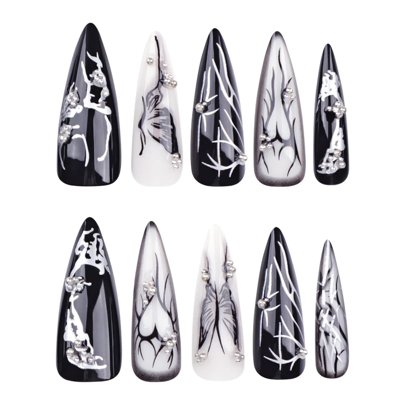 Artful Nail Art with Elegant Black and White Design Stornfield