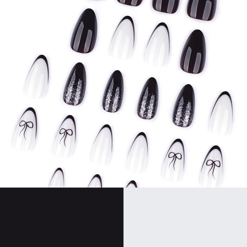 Artful nail art with elegant bow pattern and glitter accents Stornfield