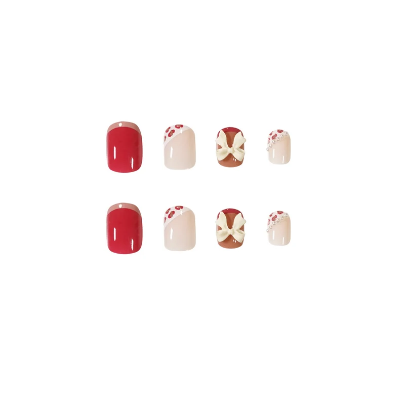 Artful nail art with elegant bow design Stornfield