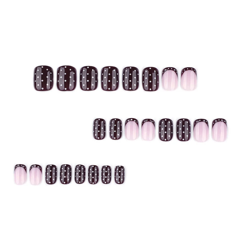 Artful nail art with elegant polka dot design Stornfield