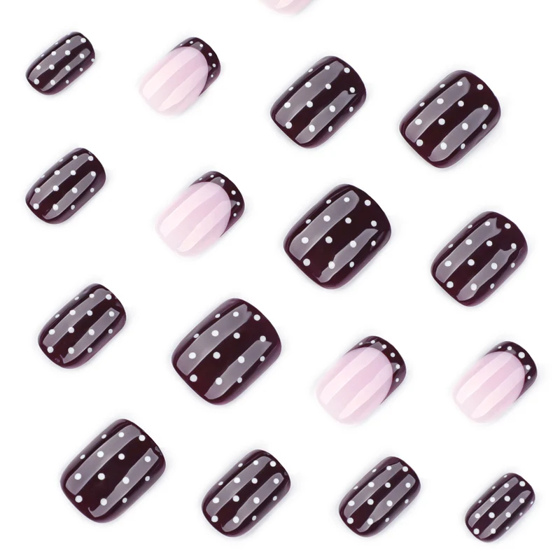 Artful nail art with elegant polka dot design Stornfield