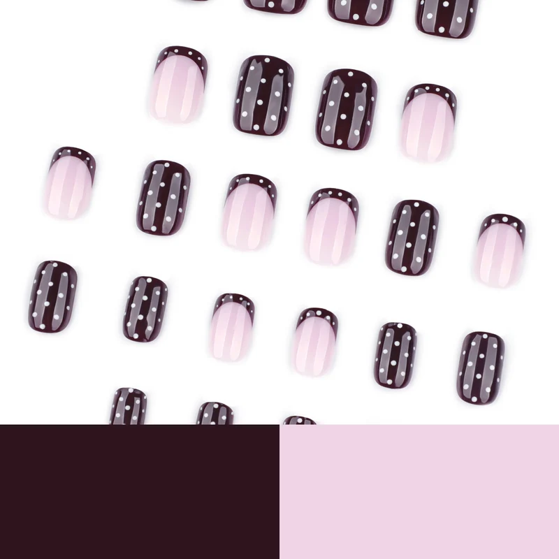 Artful nail art with elegant polka dot design Stornfield