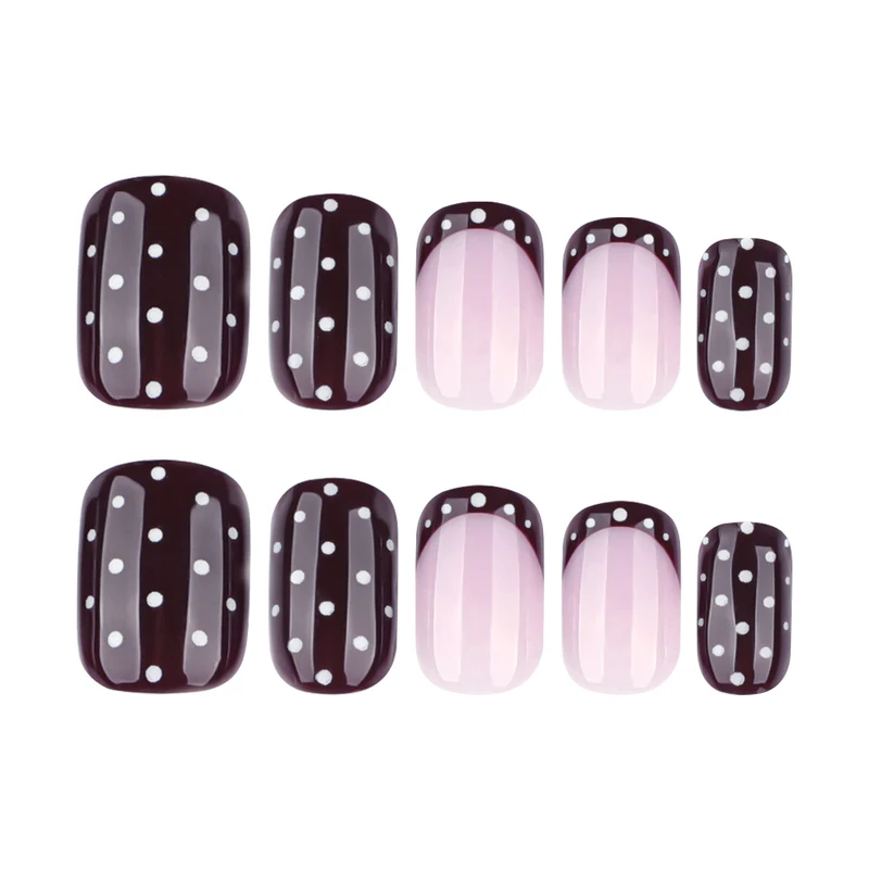 Artful nail art with elegant polka dot design Stornfield