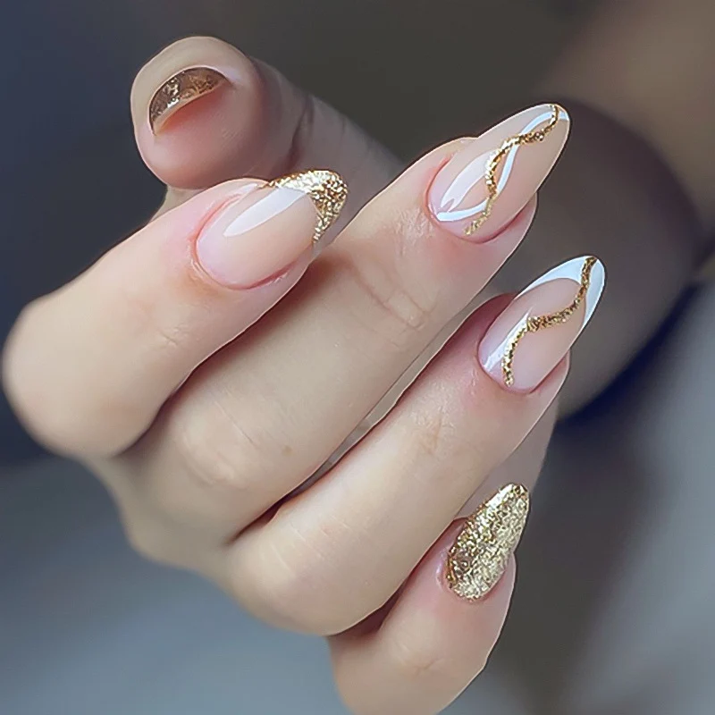 Artful nail art with elegant gold design Stornfield