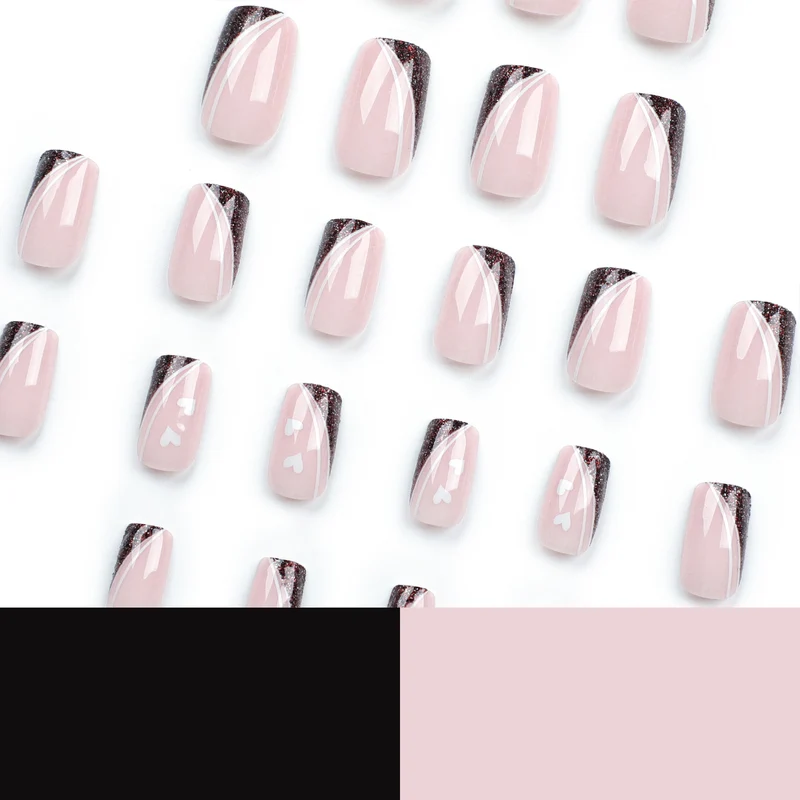 Artistic Nail Art with Elegant Glitter and Heart Design Stornfield