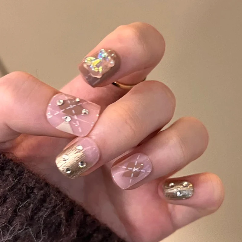 Artful nail art with elegant floral design and glitter accents Stornfield