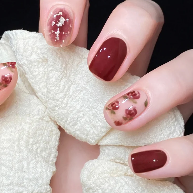 Artful nail art with elegant floral design Stornfield