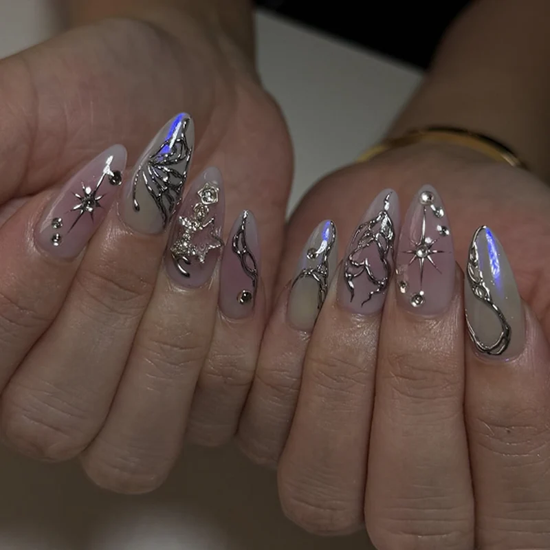 Artistic nail art with unique 3D decorations and glitter accents Stornfield