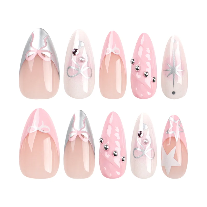 Artistic Nail Art with decorative bows and glitter accents Stornfield