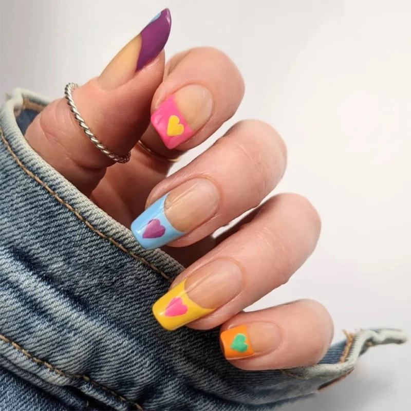Artful Nail Art with Colorful Heart Designs Stornfield