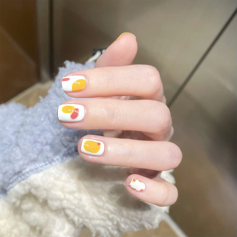 Artful Nail Art with Colorful Accents Stornfield