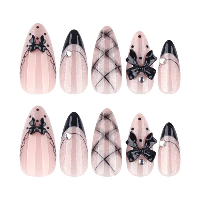 Artful Nail Art with Bow and Rhinestone Decorations Stornfield