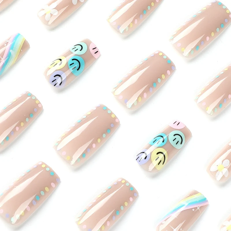 Artful Nail Art with Flower and Smiley Motifs Stornfield
