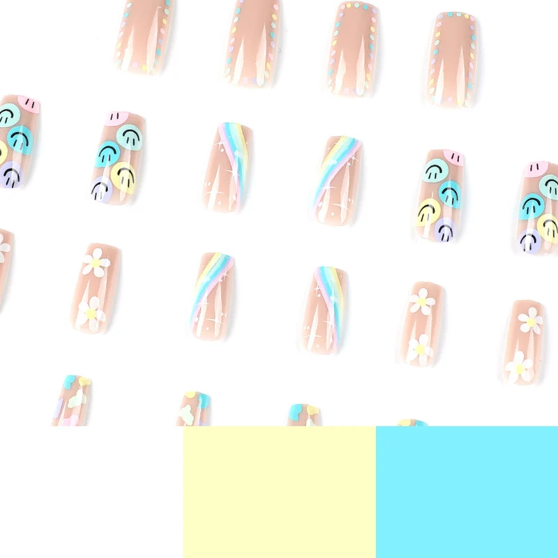 Artful Nail Art with Flower and Smiley Motifs Stornfield