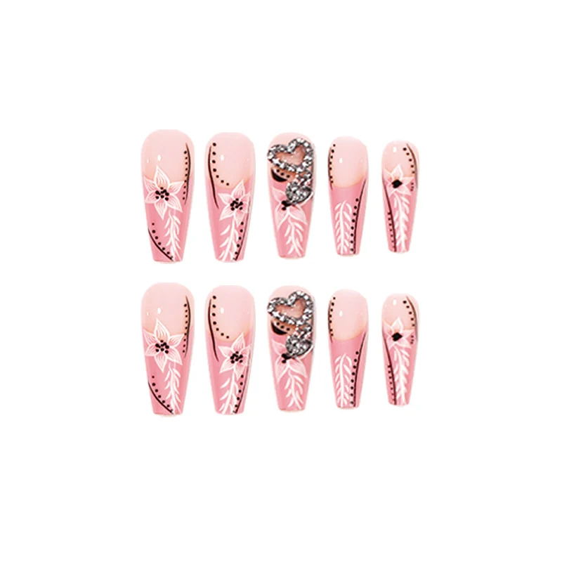 Artistic nail art with flower and heart motifs Stornfield
