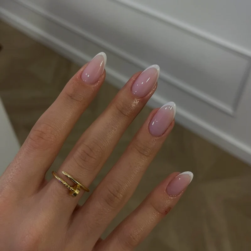 Artful Nail Art with Flower Design and Blue French Tip Stornfield
