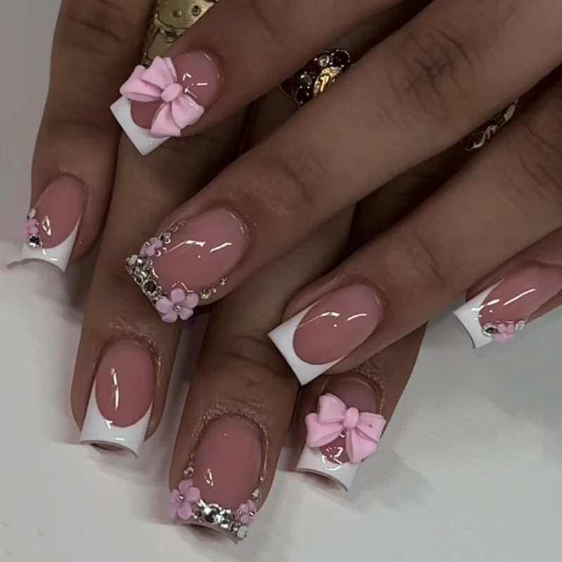 Artful Nail Art with Flower Design and Blue French Tip Stornfield