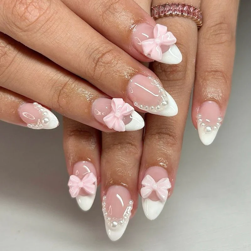 Artful Nail Art with Flower Design and Blue French Tip Stornfield