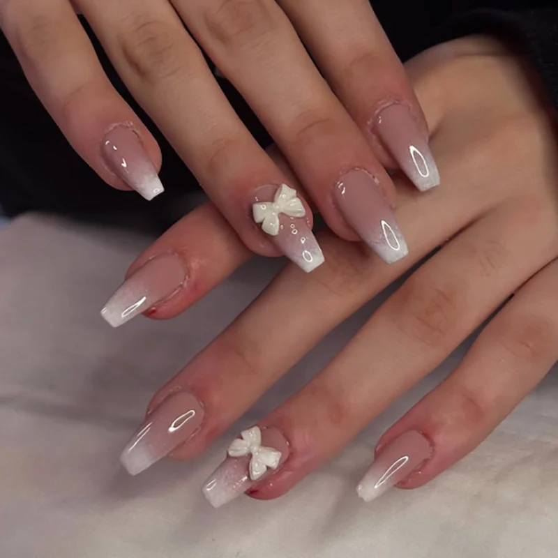 Artful Nail Art with Flower Design and Blue French Tip Stornfield