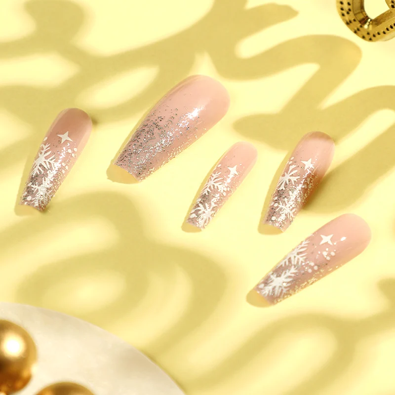 Artful nail art in winter design with glitter and snowflakes Stornfield