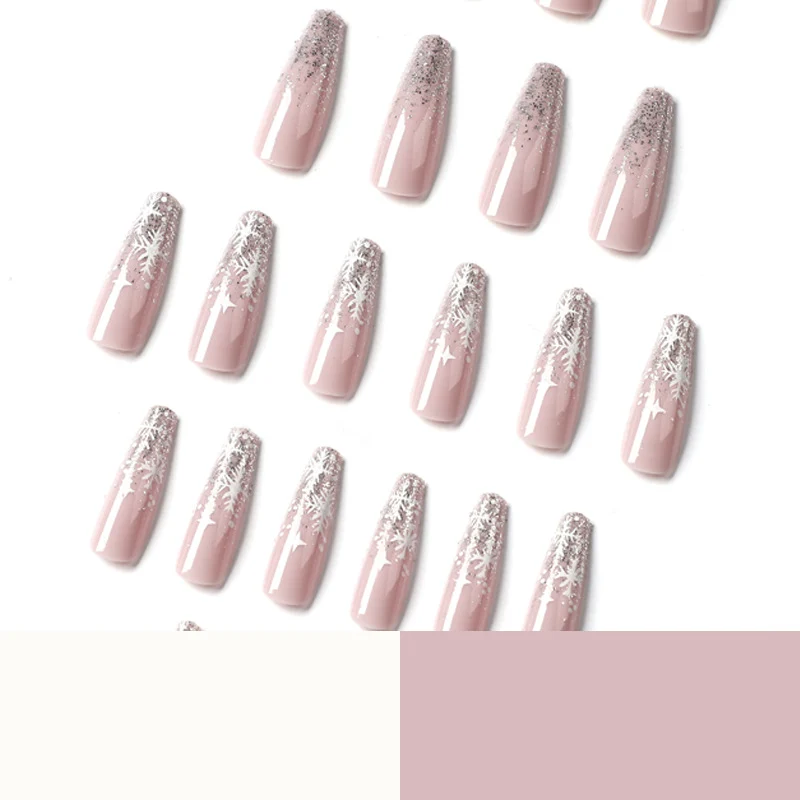 Artful nail art in winter design with glitter and snowflakes Stornfield