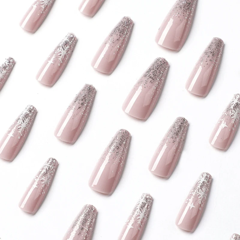 Artful nail art in winter design with glitter and snowflakes Stornfield