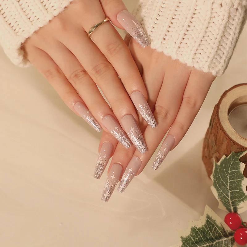 Artful nail art in winter design with glitter and snowflakes Stornfield