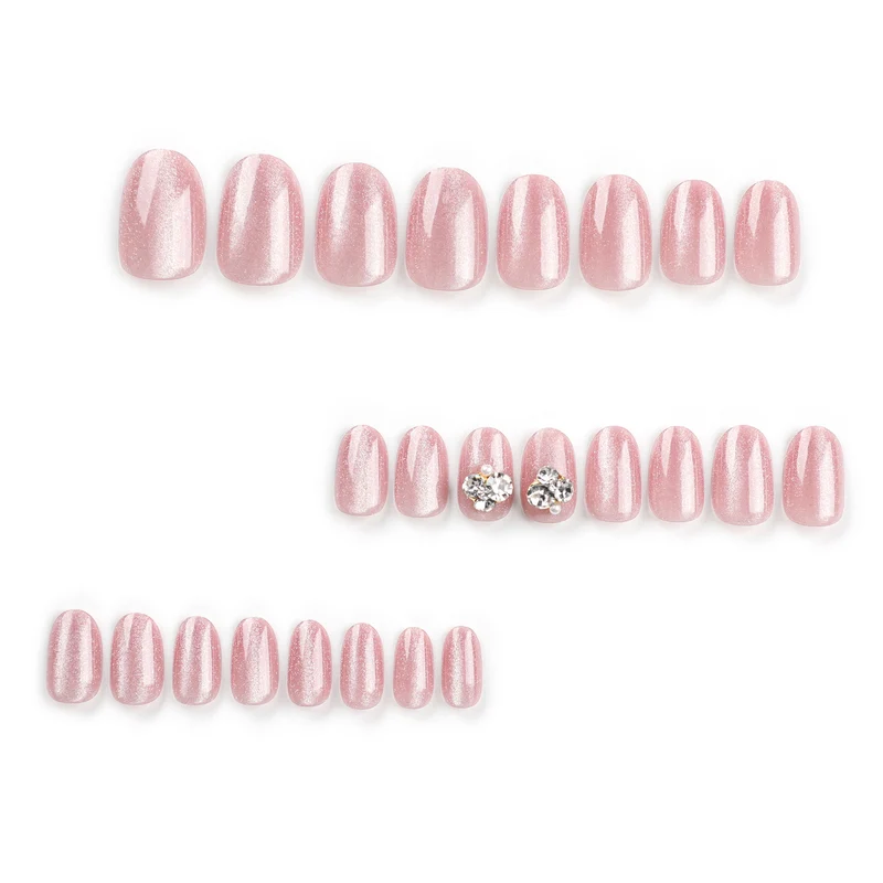 Artful glitter nail extensions with elegant rhinestone accents Stornfield