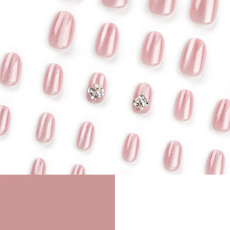 Artful glitter nail extensions with elegant rhinestone accents Stornfield