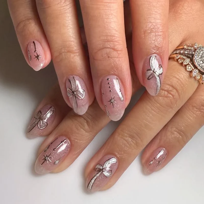 Artful glamour nail art with glossy accents Stornfield