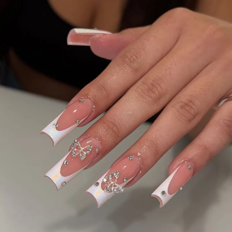 Artistic Gel Nails with Rhinestone Decorations Stornfield