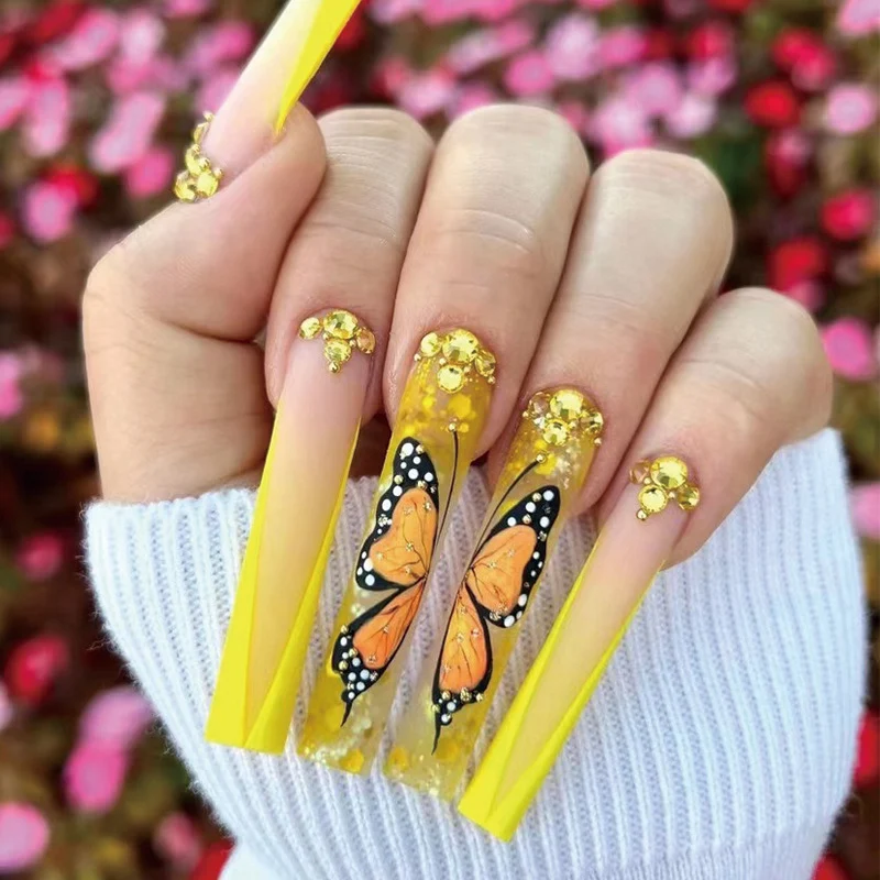 Artful Gel Nails with Butterfly Design and Glitter Stornfield